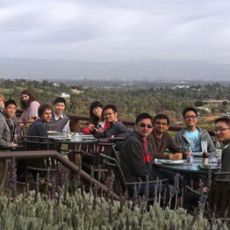 group at dining tables with panoramic valley view