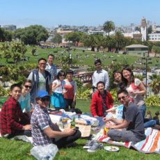 group picnicking on sunny day