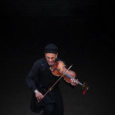 violinist plays.